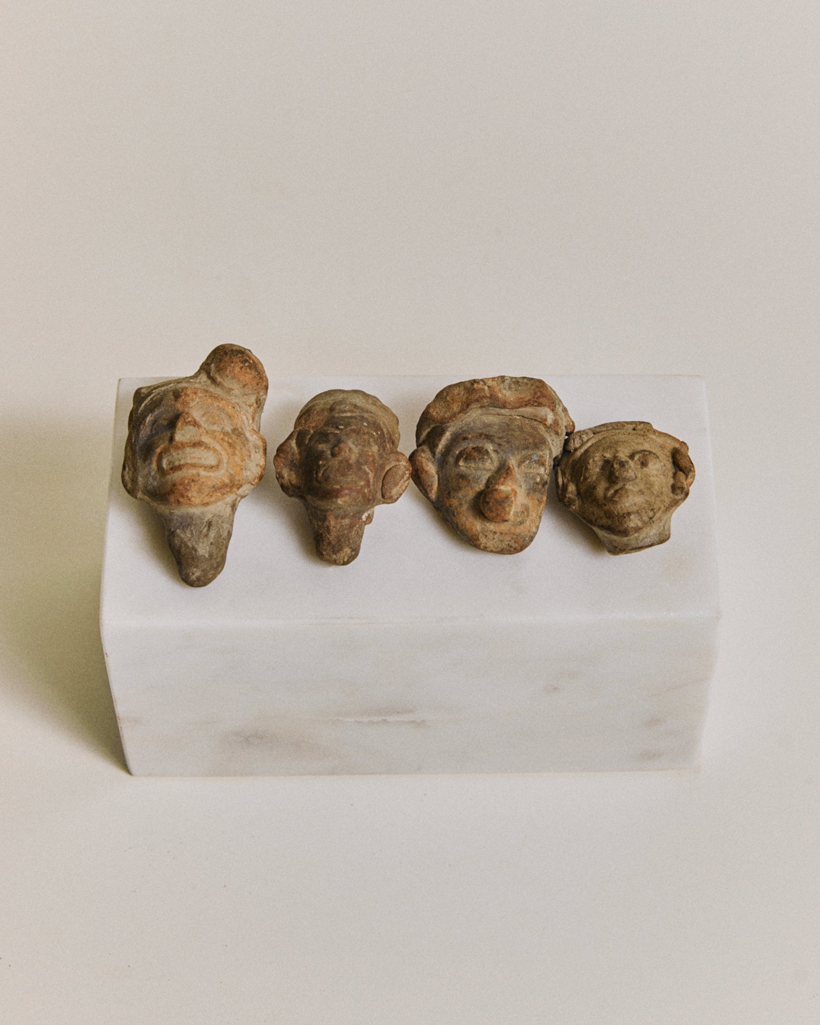 Miniature Anthropomorphic Head Amulets